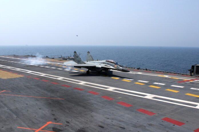Fighter aircrafts integrate with the Aircraft Carrier INS Vikrant